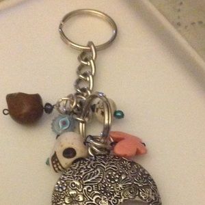 Skull key chain with assorted charms